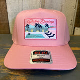 Pink 5-panel cap with structured front, mid profile, and brim sticker; suitable for casual wear.