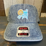 Light blue denim dad hat with lifeguard tower patch, 6-panel low profile fit; casual cotton headwear.