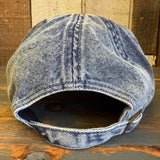 Light denim dad hat featuring a lifeguard tower design, displayed back view on a rustic wooden surface.