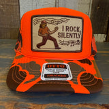 I ROCK, SILENTLY :: Trucker Hat - Neon Orange Hunters Camo/Camo Backing