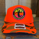 Hermosa Beach THE MECCA OF BEACH VOLLEYBALL Trucker Hat - Neon Orange Hunters Camo