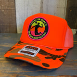Hermosa Beach THE MECCA OF BEACH VOLLEYBALL Trucker Hat - Neon Orange Hunters Camo