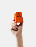Global Travel Adapter - Forget Me Not Orange