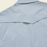 Emerger Tech Long Sleeve Shirt in sky blue, lightweight fabric with a pointed yoke detail, ideal for outdoor wear.