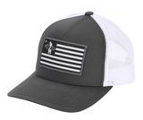 Trucker hat with flag patch showing surfer and star, mesh back, adjustable fit. Available in six colors.
