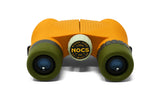 Yellow and green waterproof binoculars, compact and durable for outdoor travel and adventure use.