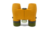 Yellow-green, ribbed waterproof binoculars with center focus; durable build, ideal for travel use.