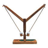 Wooden Swing Putt Head 2 Head game with rectangular acacia wood base, used for tabletop putting contests.