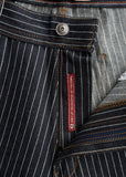 Dark wash striped denim pants with metal button and red label, designed for everyday wear.