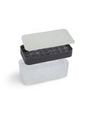 Charcoal silicone ice tray and storage box, shown separated and filled with ice cubes.