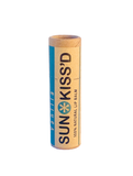 0.25 oz Sun*Kissd lip balm tube with a brown and teal label, designed for lip care, shown on a white background.