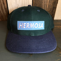 Hermosa Beach BLUE SUPREME HERMOSA - 6 Panel Low Profile Baseball Cap with Adjustable Strap with Press Buckle - Dark Green/Navy