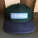 Hermosa Beach BLUE SUPREME HERMOSA - 6 Panel Low Profile Baseball Cap with Adjustable Strap with Press Buckle - Dark Green/Navy
