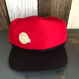 Black and red 5-panel high crown cap, cotton material, with a mini shell logo patch on the front.