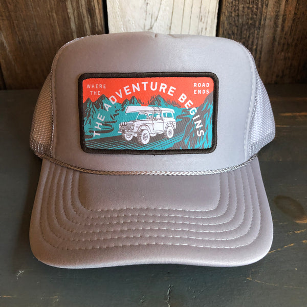 WHERE THE ROAD ENDS - THE ADVENTURE BEGINS - High Crown Trucker Hat - Grey (Curved Brim)