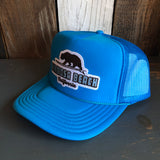 Hermosa Beach SURFING GRIZZLY BEAR Trucker Hat - Neon Blue