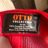 Detail of black, white, and red trucker hat label displaying material and size information.