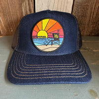Hermosa Beach OBLIGATORY SUNSET Premium Denim Trucker Hat - Navy/Gold Stitching