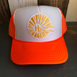 Neon orange and white trucker hat with classic logo, mesh back, and adjustable strap; ideal for casual beachwear.