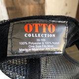 Black and white trucker hat with mesh panels and adjustable snapback; one size fits most.